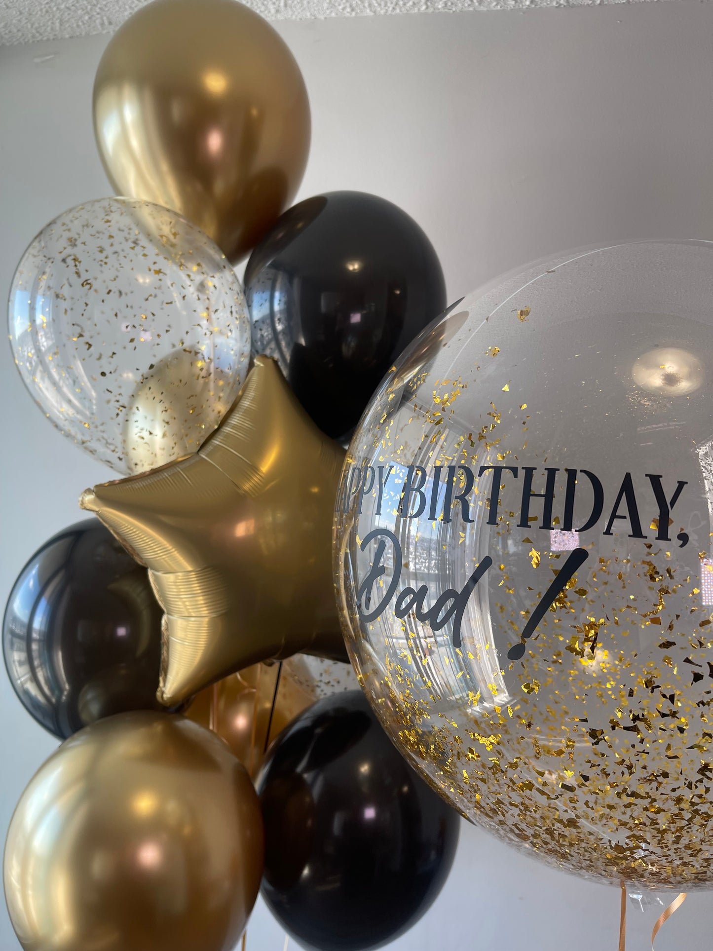 Helium balloon bouquet for men 10 black and gold