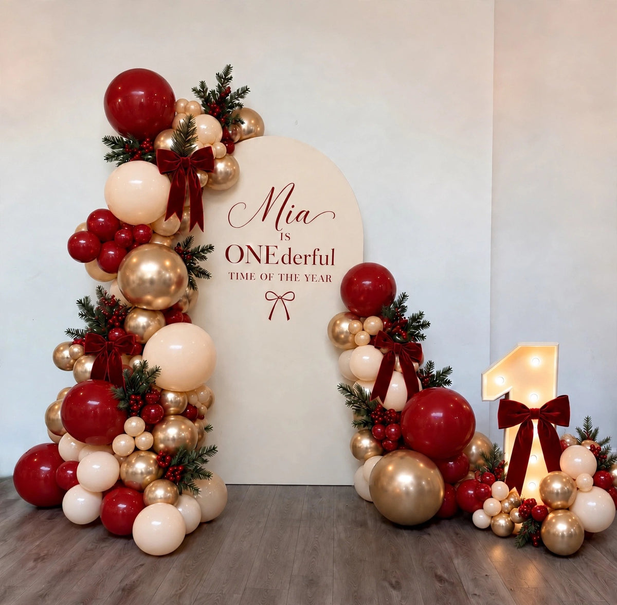 Christmas ONEderful first birthday balloon backdrop with marquee number 1