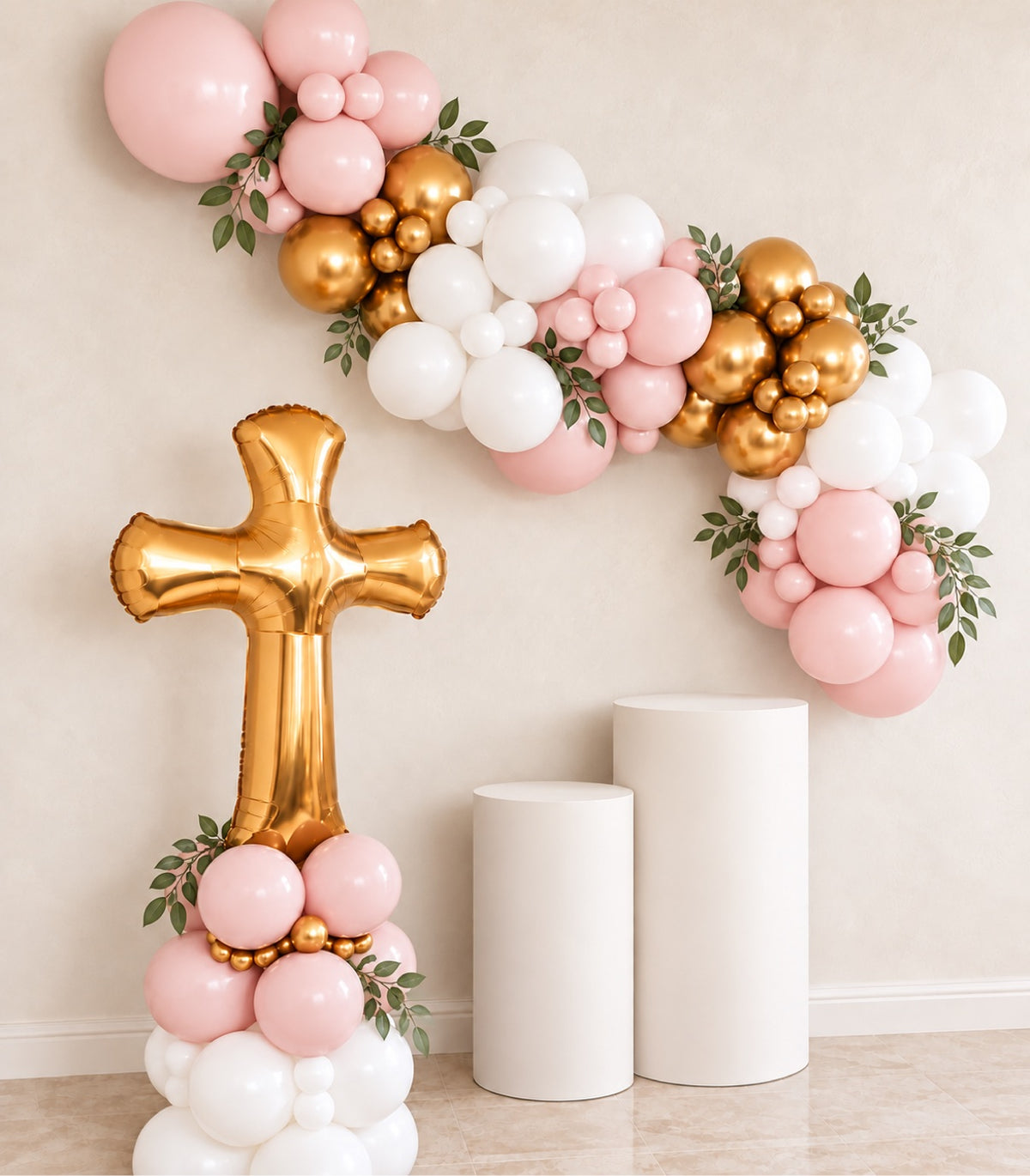 Pink, white and gold baptism balloon garland with greenery and a gold cross balloon column – christening decor in Ottawa