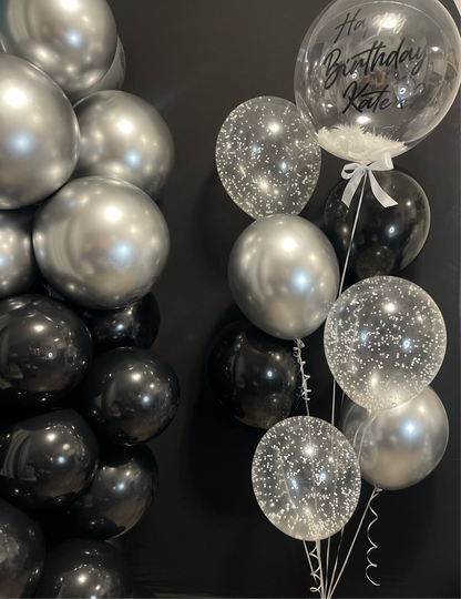 Black and silver backdrop with chains