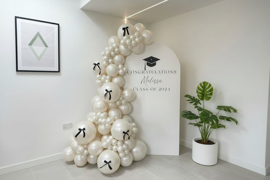 Elegant White Graduation Photo Backdrop with Balloon Garland & Custom Text