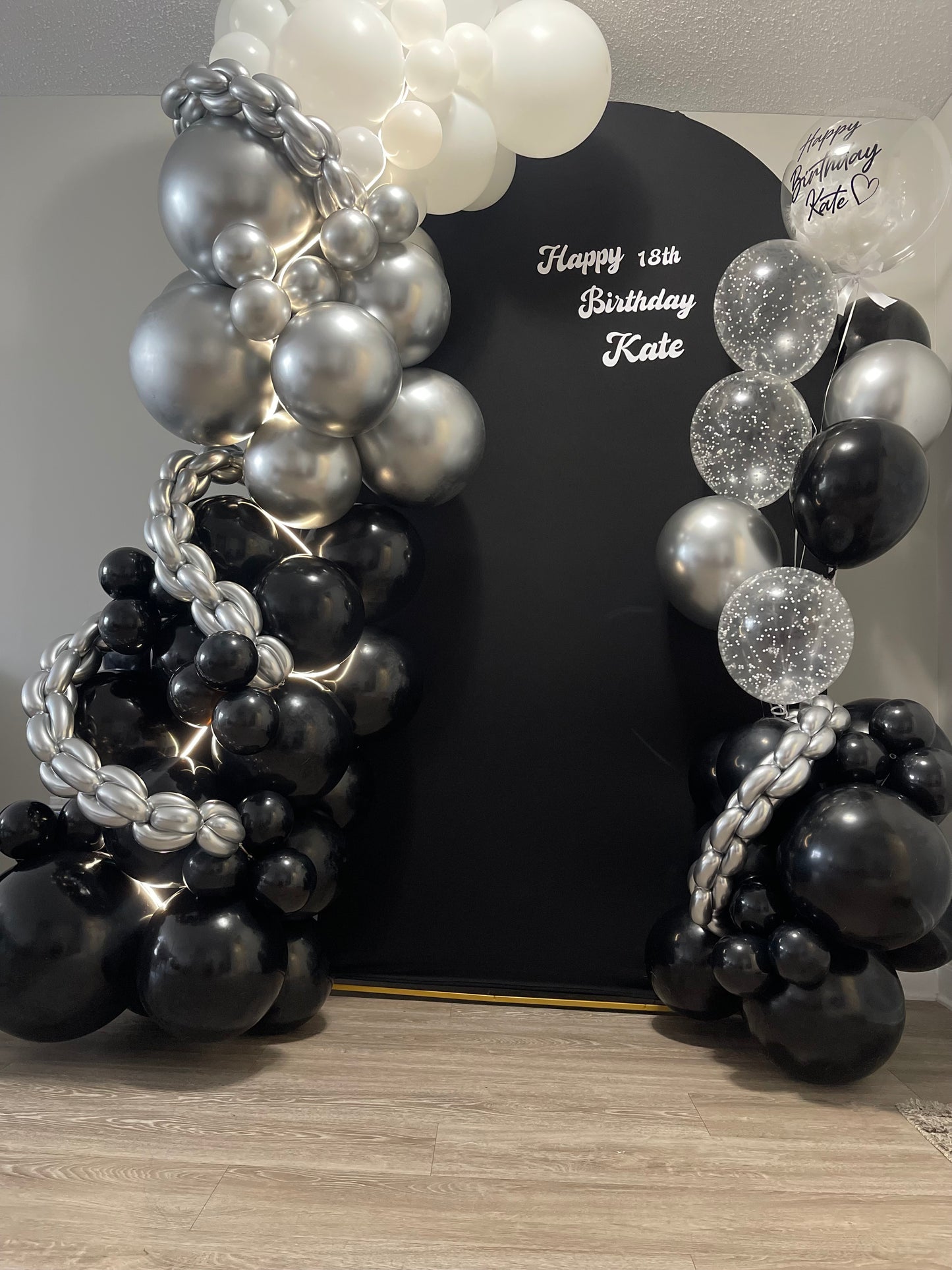 Black and silver backdrop with chains