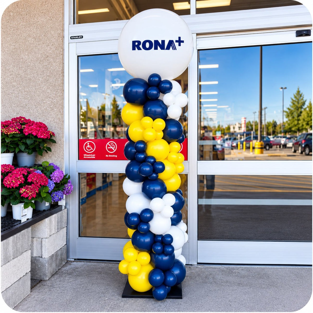 Organic balloon column / pillar with RONA logo topper at a store entrance