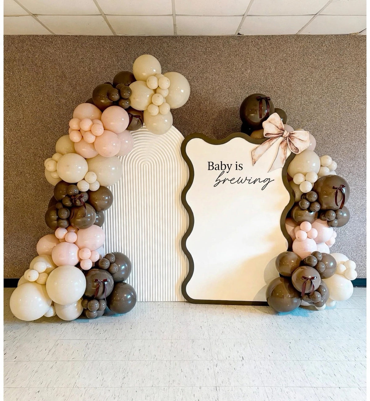 Baby is brewing baby shower balloon backdrop in cream, blush and brown