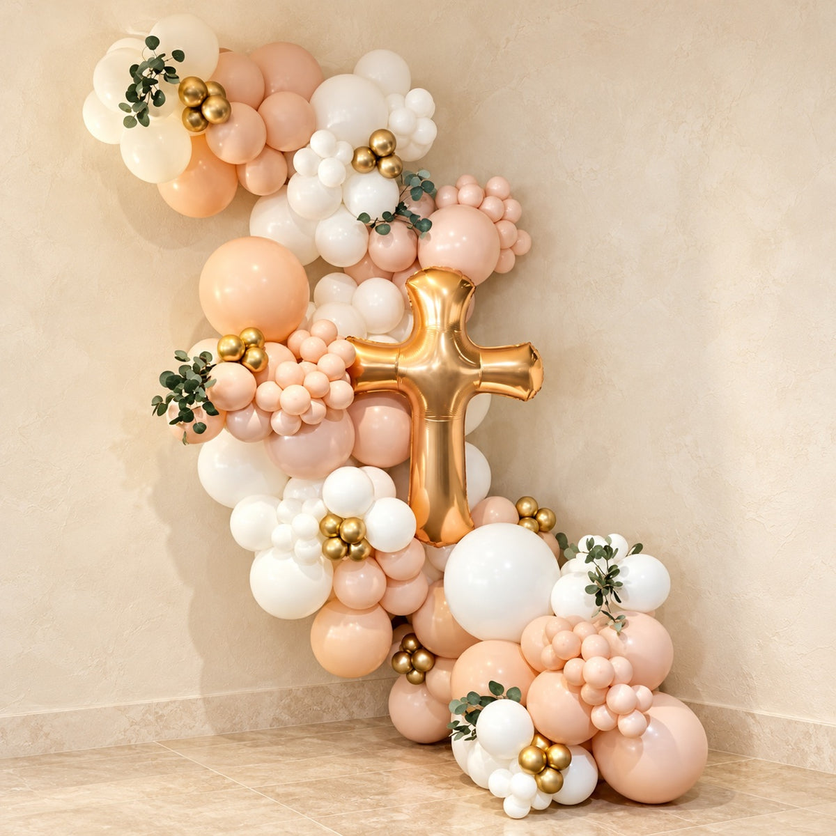 Baptism balloon garland in blush, white and gold with a gold cross and eucalyptus – christening decor in Ottawa