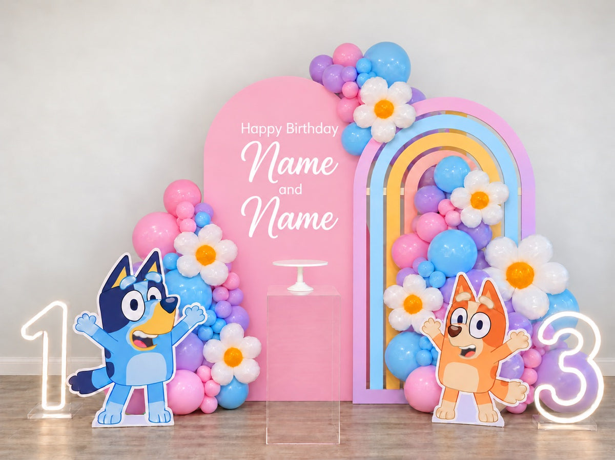 Bluey and Bingo pastel birthday balloon backdrop with rainbow arch and personalized name panel