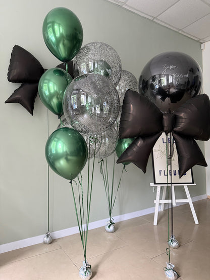 Birthday bouquet with large black foil bow and personalized balloon