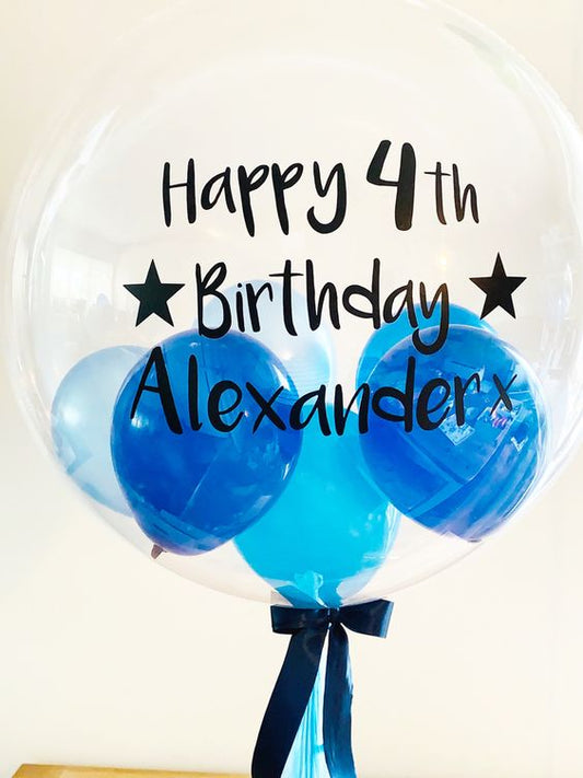 Large personalized helium balloon bouquet with blue balloons and smaller coordinating balloons