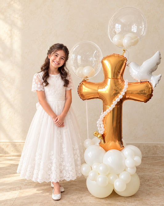 First Communion balloon arrangement: gold cross balloon column with a white dove, pearl rosary and bubble balloons – Ottawa