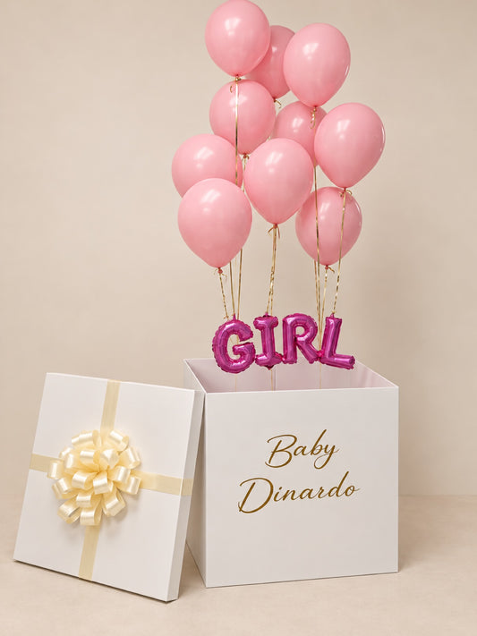 Gender reveal surprise balloon box with pink GIRL foil letters and pink helium balloons