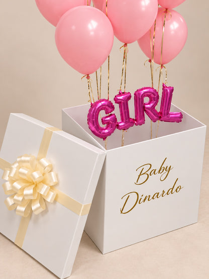 Gender reveal surprise balloon box with golden bow and personalized name