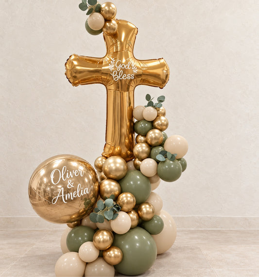 God Bless balloon arrangement: gold cross with a personalized gold orb balloon in sage, ivory and gold – baptism decor in Ottawa