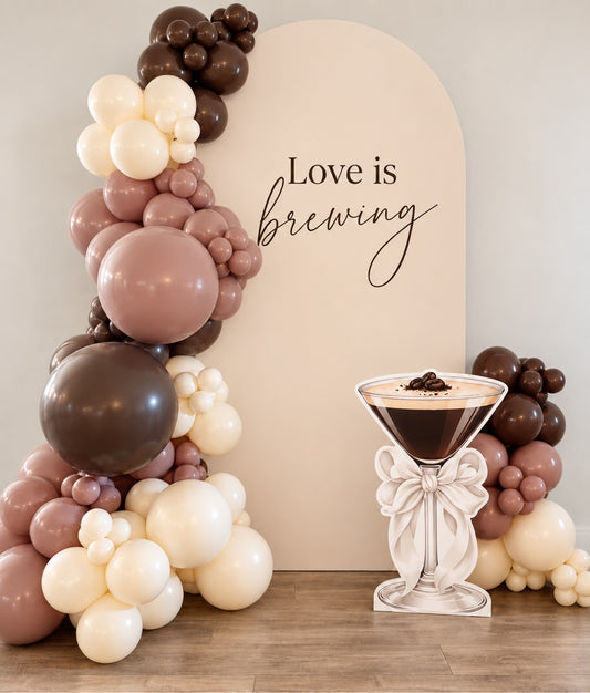 Love is brewing espresso martini bridal shower balloon backdrop in beige and brown