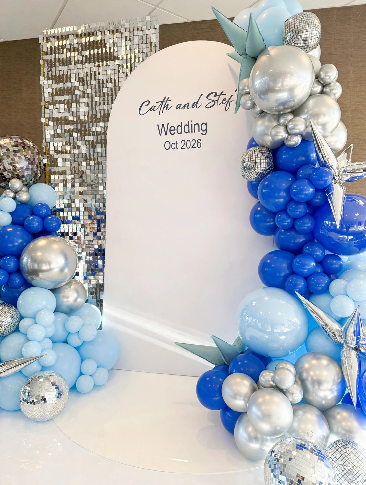 Blue and silver wedding balloon garland with disco balls, detail